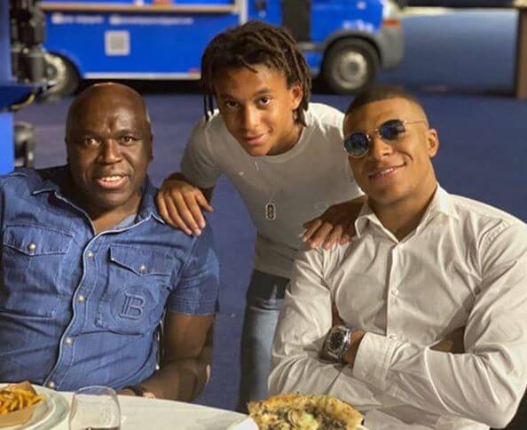 Ethan Mbappe with his dad, Wilfried Mbappe, and brother, Kylian Mbappe.